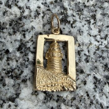 Light House Pendant in polished 14K yellow gold showing a lighthouse silhouette