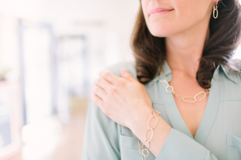 Multi Link bracelet featuring large hammered oval links in 14K yellow gold