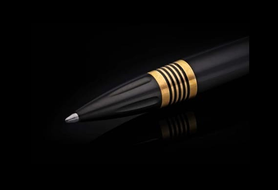 Caribe 11 Titanium Executive Pen with Art Deco stainless steel details resting on white background