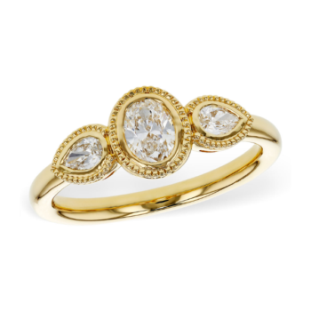 Three stone diamond engagement ring with classic setting