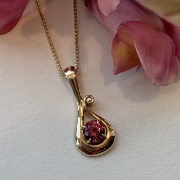 Tourmaline drop pendant necklace featuring vibrant October birthstone
