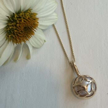 Elegant pearl drop necklace with a single lustrous pearl